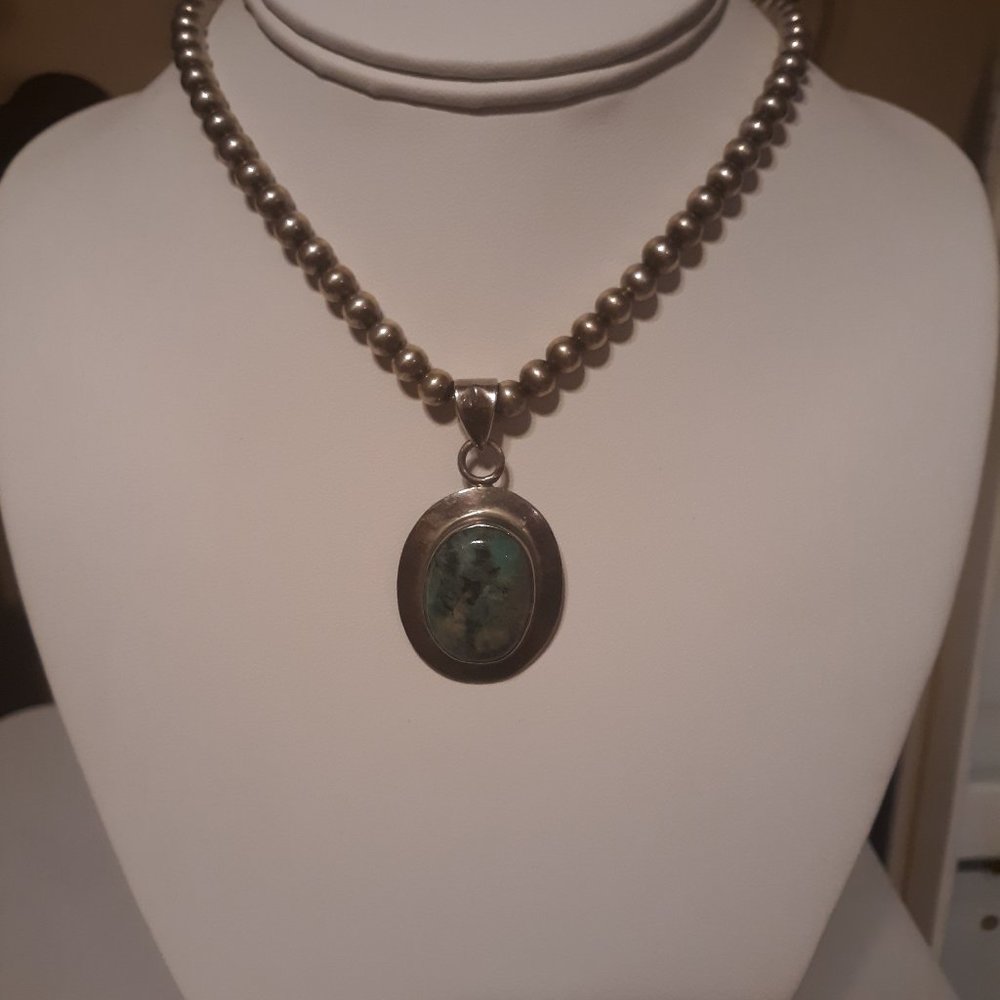 Oblong Circular  Hand Crafted Pendant with Bail
